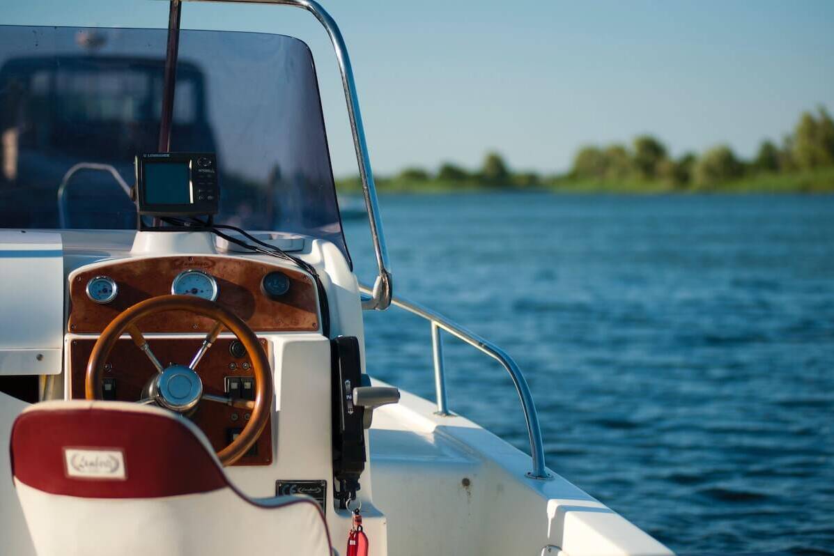 view of boat steering wheel on the water